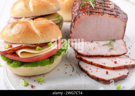 Homemade sandwich made of vegetables and ham. Sandwich with vegetables and ham. Stock Photo