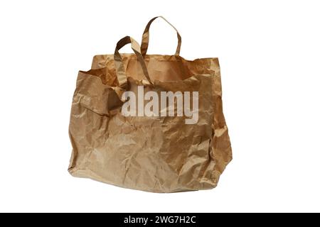 crumpled paper bag with handles on a white background, isolated Stock Photo