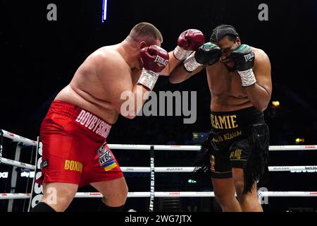 Kostiantyn Dovbyshchenko (left) in action against Jeamie 'TKV' Tshikeva in the Heavyweight bout at the OVO Arena Wembley, London. Picture date: Saturday February 3, 2024. Stock Photo