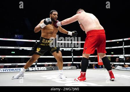 Jeamie 'TKV' Tshikeva (left) in action against Kostiantyn Dovbyshchenko in the Heavyweight bout at the OVO Arena Wembley, London. Picture date: Saturday February 3, 2024. Stock Photo