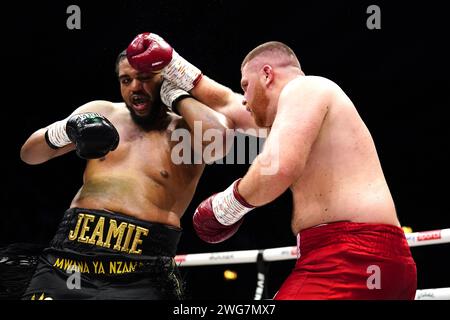 Jeamie 'TKV' Tshikeva (left) in action against Kostiantyn Dovbyshchenko in the Heavyweight bout at the OVO Arena Wembley, London. Picture date: Saturday February 3, 2024. Stock Photo