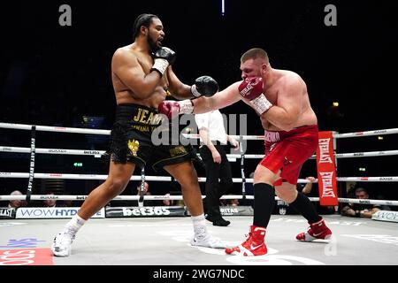 Jeamie 'TKV' Tshikeva (left) in action against Kostiantyn Dovbyshchenko in the Heavyweight bout at the OVO Arena Wembley, London. Picture date: Saturday February 3, 2024. Stock Photo