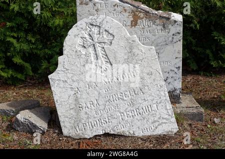 Old broken tombstone in a graveyard, Rawdon,Quebec,Canada Stock Photo
