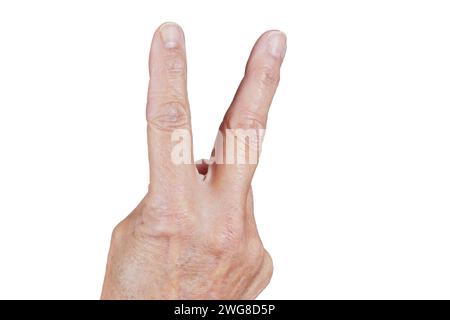 Close up of mature female hand holding up two fingers Stock Photo
