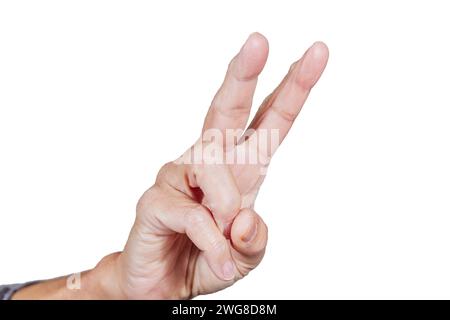Close up of mature female hand holding up two fingers Stock Photo