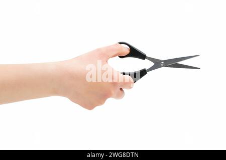 Cropped shot of an unrecognizable woman hand using a small scissors isolated on a white background Stock Photo