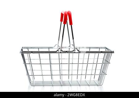 Empty shopping basket metal with red handles Stock Photo