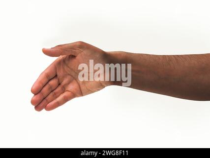 Cropped shot of an unrecognizable man hand ready for handshaking on a white isolated background Stock Photo