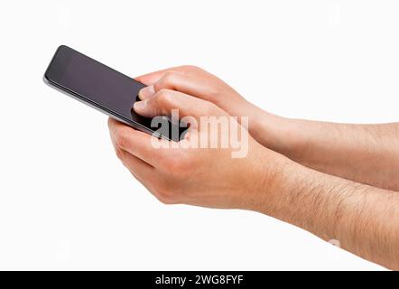 Cropped shot of an unrecognizable man hands writing with his thumbs on a mobile phone isolated on a white background Stock Photo