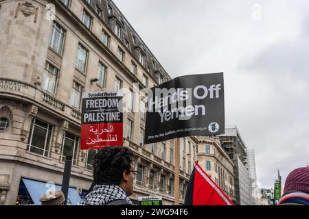 London, UK. 3rd February 2024. Freedom for Palestine and Hands off Yemen banners held by peace activists and protesters during the Pro - Palestine march through Oxford Street in Soho, Free Palestine Movement, London, UK Stock Photo