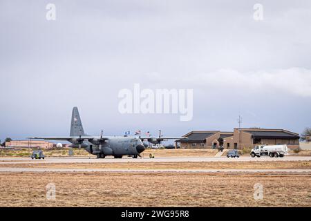 A U.S. Air Force C-130H Hercules aircraft, assigned to the 180th Airlift Squadron, sets on the flight line at Fort Huachuca, Arizona, during Winter Training at the Advanced Tactics Training Center, January 23, 2024. Winter Training is a break from the regular course schedule where the instructors of AATTC tweak the training scenarios for the coming year and perform them, with the help of guest units, to keep their skills fresh.  Since 1983 the AATTC has provided advanced tactical training to mobility aircrews from the Air National Guard, Air Force Reserve Command, Air Mobility Command, Air Com Stock Photo