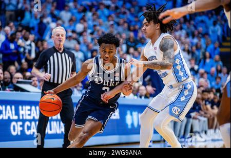 Chapel Hill, NC, USA. 3rd Feb, 2024. Duke Blue Devils guard Jeremy Roach (3) drives around North Carolina Tar Heels guard Elliot Cadeau (2) in the ACC basketball matchup at Dean Smith Center in Chapel Hill, NC. (Scott Kinser/CSM). Credit: csm/Alamy Live News Stock Photo