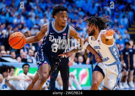 Chapel Hill, NC, USA. 3rd Feb, 2024. Duke Blue Devils guard Jeremy Roach (3) drives by North Carolina Tar Heels guard RJ Davis (4) in the ACC basketball matchup at Dean Smith Center in Chapel Hill, NC. (Scott Kinser/CSM). Credit: csm/Alamy Live News Stock Photo