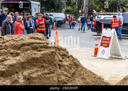 Santa Barbara, USA. 03rd Feb, 2024. The Santa Barbara Bucket Brigade helps residents fill sandbags at Manning Park in Santa Barbara, CA on February 3, 2024 in advance of a large winter storm hitting Santa Barbara and the California Central Coast. (Photo by Rod Rolle/Sipa USA) Credit: Sipa USA/Alamy Live News Stock Photo