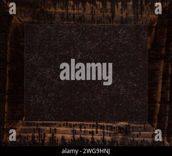 Vintage wooden frame on top of a blackboard / chalkboard for copy space. Stock Photo