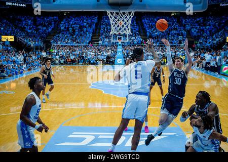 Chapel Hill, NC, USA. 25th Apr, 2023. Duke Blue Devils center Kyle Filipowski (30) shoots over North Carolina Tar Heels forward Armando Bacot (5) in the ACC basketball matchup at Dean Smith Center in Chapel Hill, NC. (Scott Kinser/CSM). Credit: csm/Alamy Live News Stock Photo