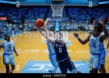 Chapel Hill, NC, USA. 25th Apr, 2023. Duke Blue Devils guard Jared McCain (0) shoots against North Carolina Tar Heels guard Cormac Ryan (3) in the ACC basketball matchup at Dean Smith Center in Chapel Hill, NC. (Scott Kinser/CSM). Credit: csm/Alamy Live News Stock Photo