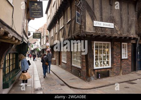 YORK, UK - April 19, 2023. The Shambles, a famous narrow medieval street in historic city of York, UK Stock Photo