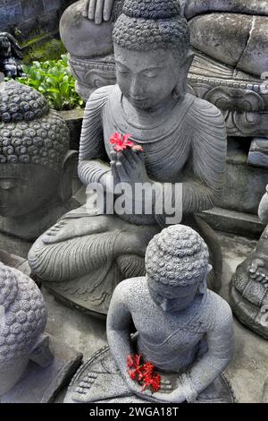 Buddha figures in a stonemason's studio near Ubud, Bali, Indonesia Stock Photo