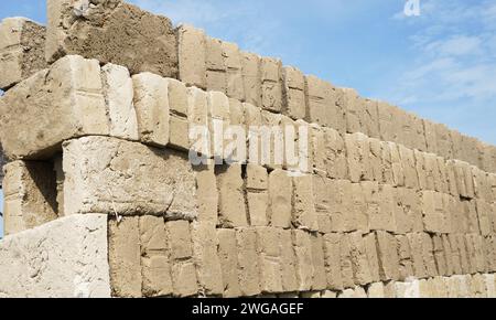 Raw traditional Indonesian bricks being dried in the sun Stock Photo