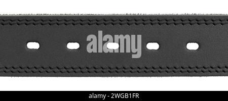 Fragment of a black genuine leather belt with holes on a white background, isolated Stock Photo