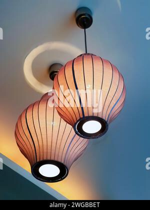 Silk fabric lantern ceiling lamp, vintage design bubble hanging, low angle view, home décor pendant for interior design, Lumiere Shades object element Stock Photo
