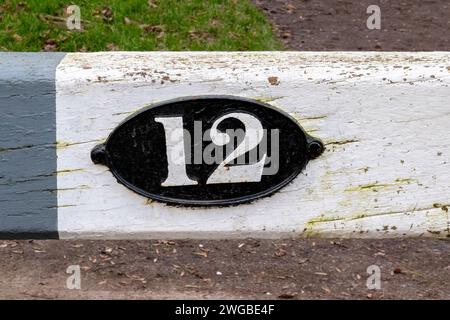 No 12 sign on canal lock gate cheshire Stock Photo