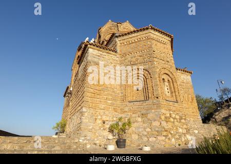 Outside the Church of Saint John at Kaneo on the clifftops of Ohrid in North Macedonia. Taken on a beautiful sunny day with cloudless blue sky. Stock Photo