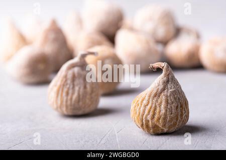 dried figs floured with rice flour. Selective focus on the foreground. Stock Photo