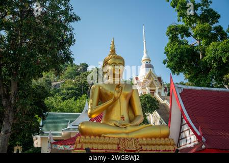a Big Buddha at the Wat Khao Takiab on the Chpstick Hill in the town of khao Takiab south of the City of Hua Hin in the Province of Prachuap Khiri Kha Stock Photo