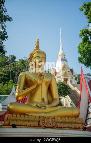 a Big Buddha at the Wat Khao Takiab on the Chpstick Hill in the town of khao Takiab south of the City of Hua Hin in the Province of Prachuap Khiri Kha Stock Photo