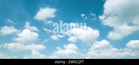 White fluffy clouds with blue sky on daylight Stock Photo