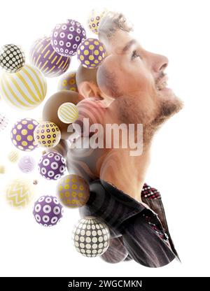 An intriguing double exposure of a male profile combined with 3D spheres Stock Photo
