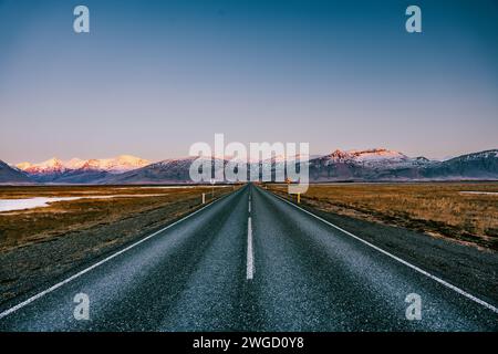A Ring road number 1 in southern Iceland with mountains and glaciers in the background Stock Photo