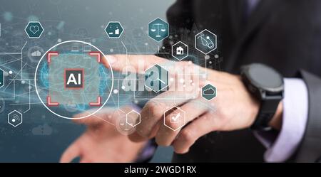 Artificial intelligence concept businessman holding ai on computer screen to using for in document management system and data analysis works Stock Photo
