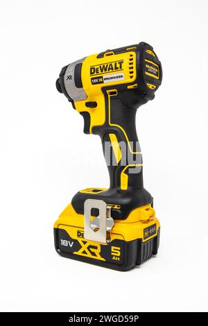 Dewalt 18V XR Brushless Impact on a white background. Stock Photo