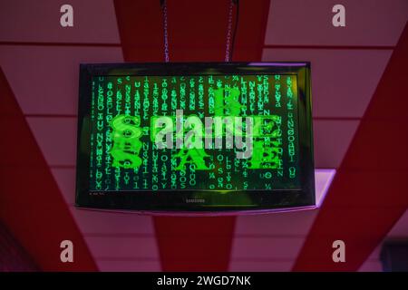 Close-up view of bowling monitor screen displaying word 'SPARE', indicating player successfully knocked down all standing pins. Sweden. Stock Photo