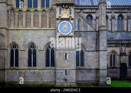 The restored exterior clock face of the Wells cathedral astronomical clock with chiming bells in Wells, Somerset, UK on 4 February 2024 Stock Photo