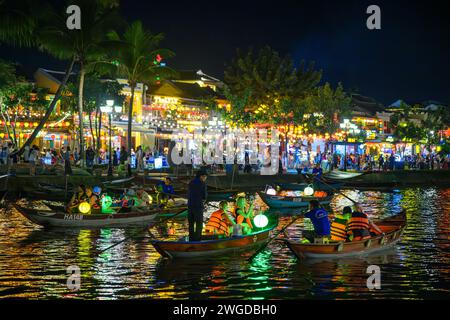Illuminated Lantern Boats on the Thu Bon river at night, Hoi An, Vietnam Stock Photo