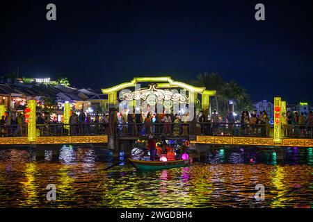 Illuminated Lantern Boats on the Thu Bon river at night, Hoi An, Vietnam Stock Photo