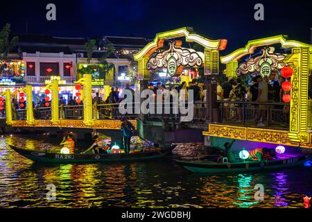 Illuminated Lantern Boats on the Thu Bon river at night, Hoi An, Vietnam Stock Photo