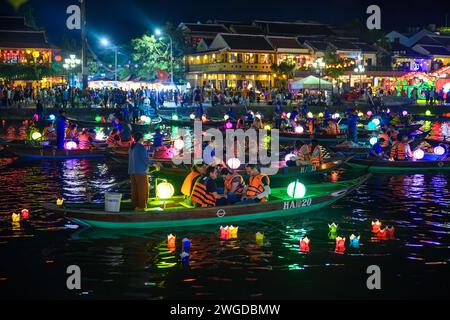 Illuminated Lantern Boats on the Thu Bon river at night, Hoi An, Vietnam Stock Photo