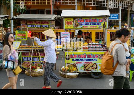 Street Food Vendors at Hoi An Night Market, Hoi An, Vietnam Stock Photo