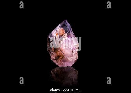smoky quartz with amethyst part photography isolated on black background. from erongo, Namibia. macro detail close-up rough raw unpolished semi-precio Stock Photo