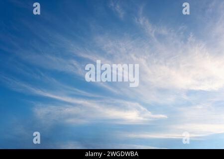 Sky, beautiful clear blue sky with fluffy soft white clouds as a natural background or surface with copy space. Natural background concept photo with Stock Photo