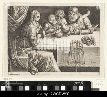 Holy family with Elisabet and Johannes de Boper, Cornelis Cort (Attributed to), after Frans Floris (I), 1550 - 1578 print Maria, Joseph and Elisabet are sitting at the table in a departure. Joseph has the Christ child on his lap. John the Baptist is on the table and puts his finger in the mouth of Christ. In the foreground a spintol.  paper engraving Holy Family with John the Baptist, Elisabeth present. spindle Stock Photo