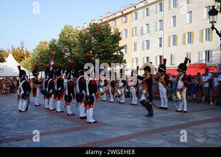 The reenactors dressed as Napoleonic soldiers for celebration the Napoleon birthday who was born in Ajaccio. Corsica island. Stock Photo