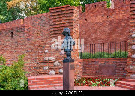 Little Insurrectionist (Maly Powstaniec) in Old Town of Warsaw, Poland Stock Photo