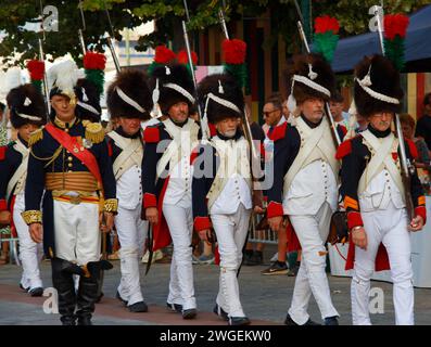 The reenactors dressed as Napoleonic soldiers for celebration the Napoleon birthday who was born in Ajaccio. Corsica island. Stock Photo