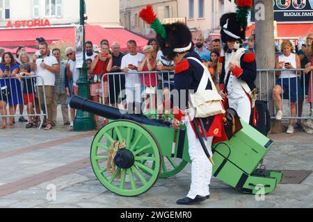 The reenactors dressed as Napoleonic soldiers for celebration the Napoleon birthday who was born in Ajaccio. Corsica island. Stock Photo